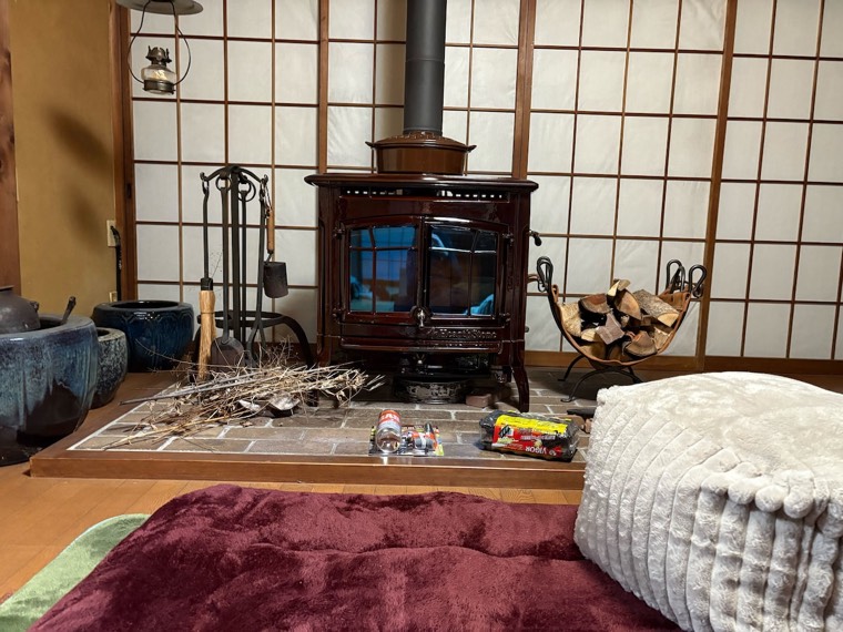 Kindling and irons by the hearth
