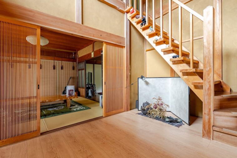 Stairs rising from the hallway