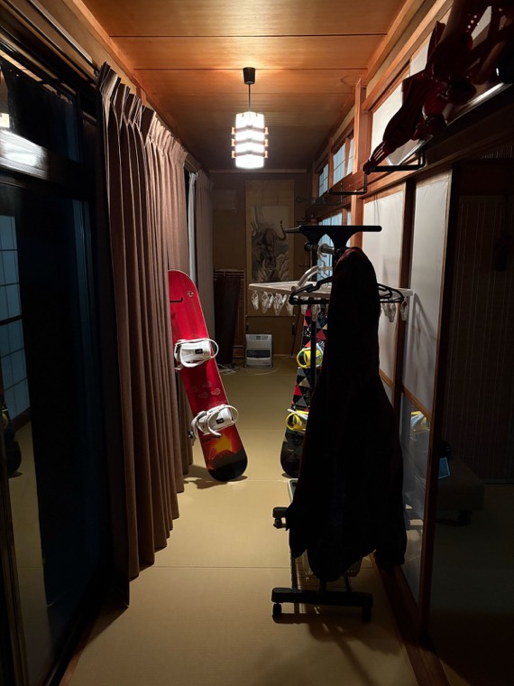 The drying corridor, hung with ski gear